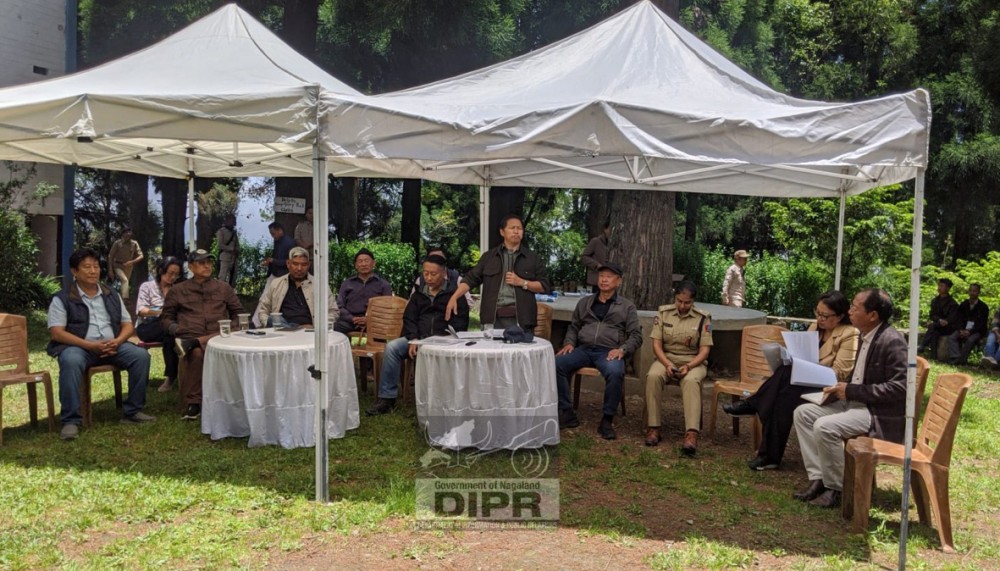 MLA and Chairman of the NLA Environment and Climate Change Committee Achumbemo Kikon addresses an interaction programme during the visit to waste dumping site and the proposed mountain radar system site at Pfütsero on May 26. (DIPR Photo)